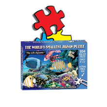 Front of World's Smallest Jigsaw Puzzle- The Life Aquatic - Measures 4 x 6 inches when assembled- Includes Tweezers. 204 die-cut pieces. Only 4 x 6 inches.